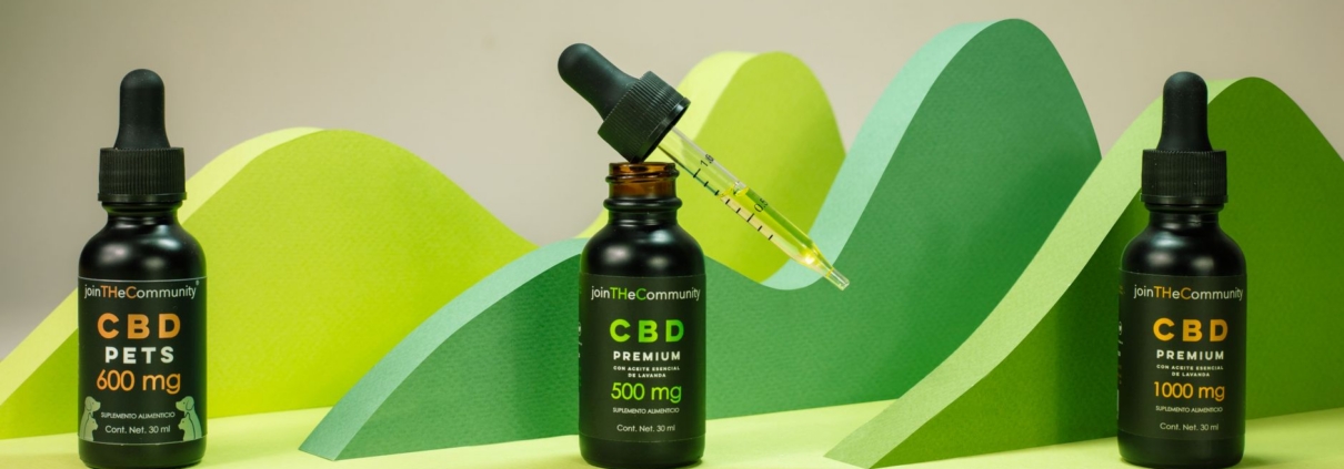 CBD oil bottles with varying dosages in a creative green backdrop, showcasing premium product packaging.